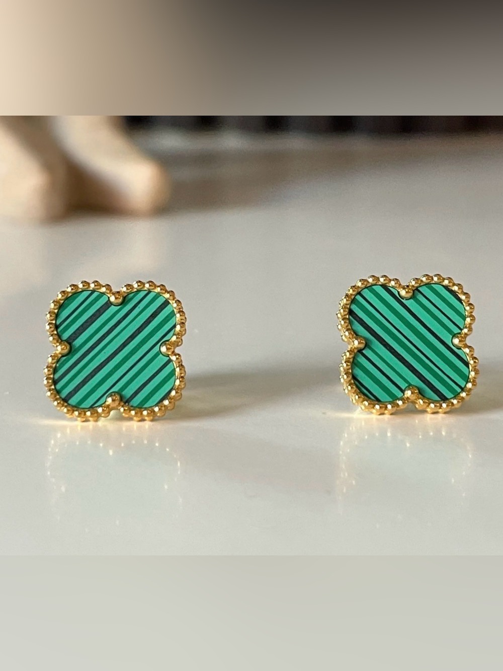 Gold-Tone four-leaf clover stud earrings lovely green faux-malachite inlay